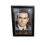 A framed and glazed presentation display, featuring an 8x10 headshot of Sean Connery as 007 James