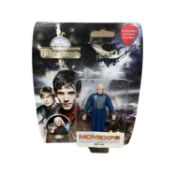 A exclusive London MCMExpo edition carded figurine of Gaius from The Adventures of Merlin, number