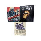 A mixed lot of large hardbound coffee table music books, to include: - The Complete Beatles