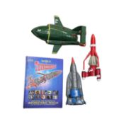 A mixed lot of Thunderbirds memorabilia, to include: - Thunderbirds 1 / 2 / 3 large plastic toys -