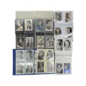 A very large quantity of black and white postcards depicting famous film and music faces of the