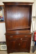 Late 19th Century American walnut bookcase cabinet with adjustable shelves to the top and drawer and