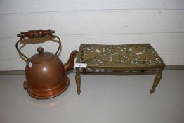 Brass trivet and a copper kettle