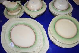 A quantity of Adams Titian ware green tinted dinner wares