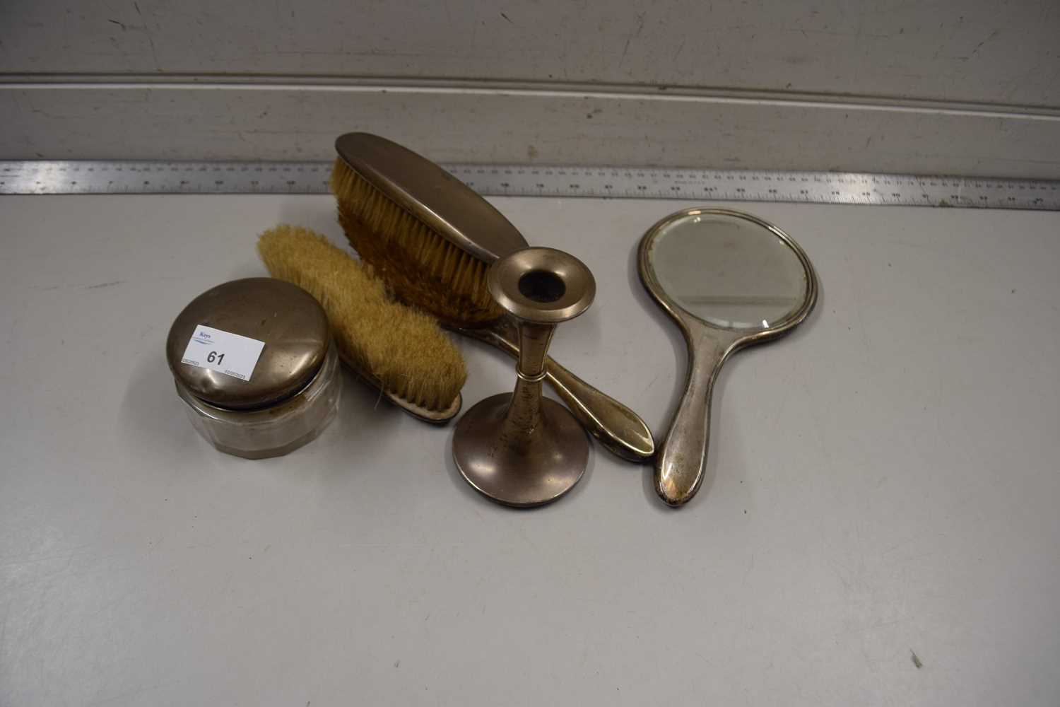 Mixed Lot: Three silver backed dressing table brushes, a silver backed mirror, silver top dressing