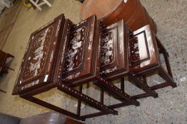 Modern Chinese nest of four hardwood and mother of pearl inlaid occasional tables, largest 51cm