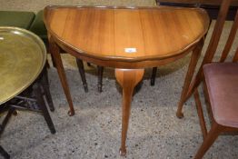 A 20th Century demi-lune hall table