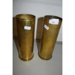 A pair of brass shell cases, 23cm high