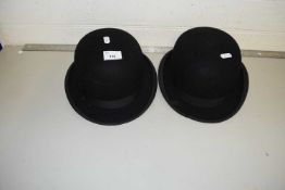 Two bowler hats, one marked Henry Heath, the other marked Simpson, Piccadilly