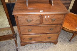 Small late 19th or early 20th Century mahogany and walnut four drawer chest, 73cm wide