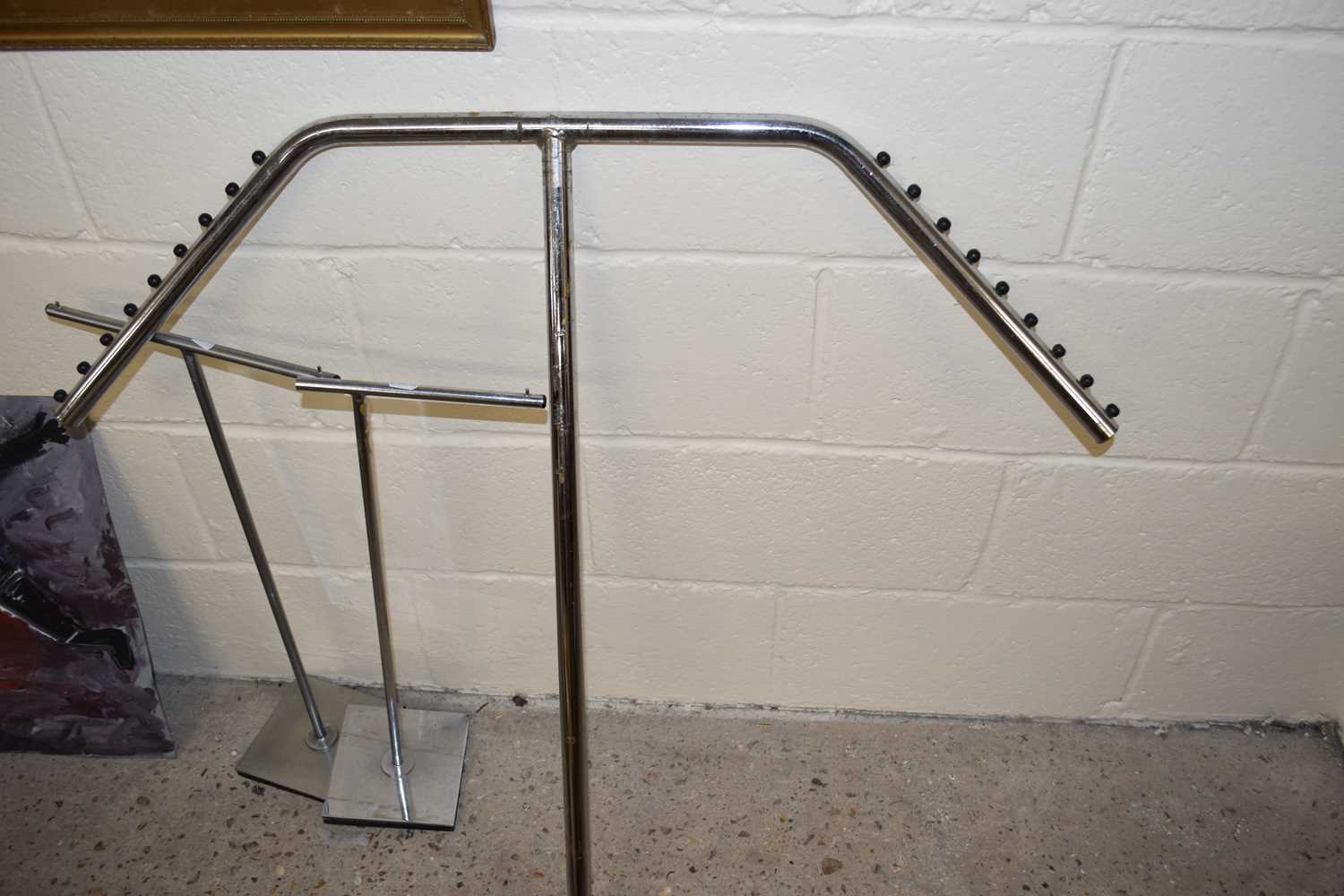 Three stainless steel stands