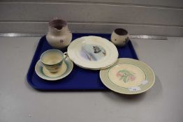 Mixed Lot: Poole Pottery jug and vase, a Newport Pottery cup and saucer in the Clarice Cliff