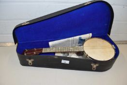 A cased ukulele
