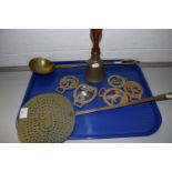 Mixed Lot: Various brass wares comprising a cream skimmer, ladle, horse brasses and a small bell
