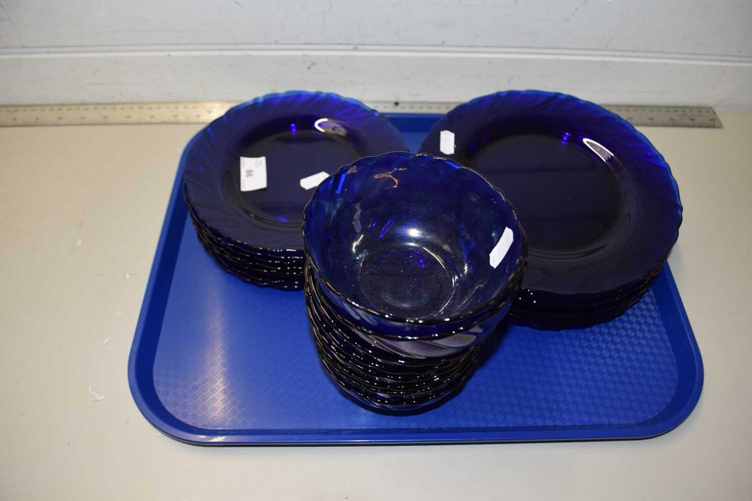 Quantity of blue glass bowls and plates