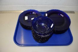 Quantity of blue glass bowls and plates