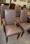 Set of four modern leather upholstered dining chairs