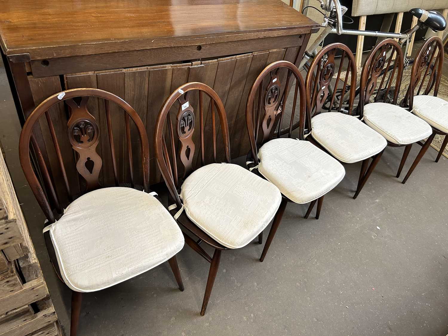 Set of six Ercol dark finish stick back chairs