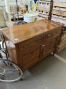 Late Victorian American walnut sideboard with two doors and two drawers, 121cm wide
