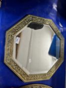 Moulded brass framed hexagonal wall mirror