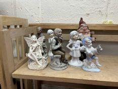 Quantity of assorted figurines including a gnome