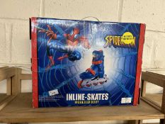 A pair of Spiderman inline-skates moulded boots, size 2-4, boxed