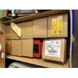 Box of wall mounted fire alarms