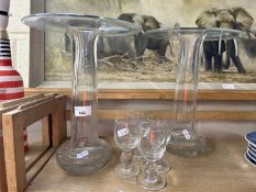 Two unusual glass vases together with four port glasses
