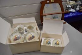 A set of four Lenox boxed Winnie-the-Pooh mugs and two Lenox Winnie-the-Pooh jars and covers