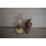Cream glass oil lamp and a vase