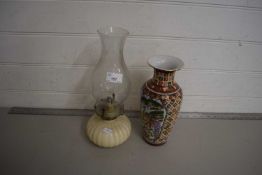 Cream glass oil lamp and a vase