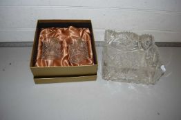 A pair of lead crystal tumblers, cased and a square cut glass fruit bowl