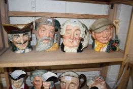 Four Royal Doulton character jugs to include Robinson Crusoe, The Lawyer, The Gardener and one