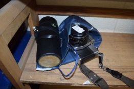 A Pratica MTL5B SLR camera together with a Super-Paragon autozoom lens 80-200mm