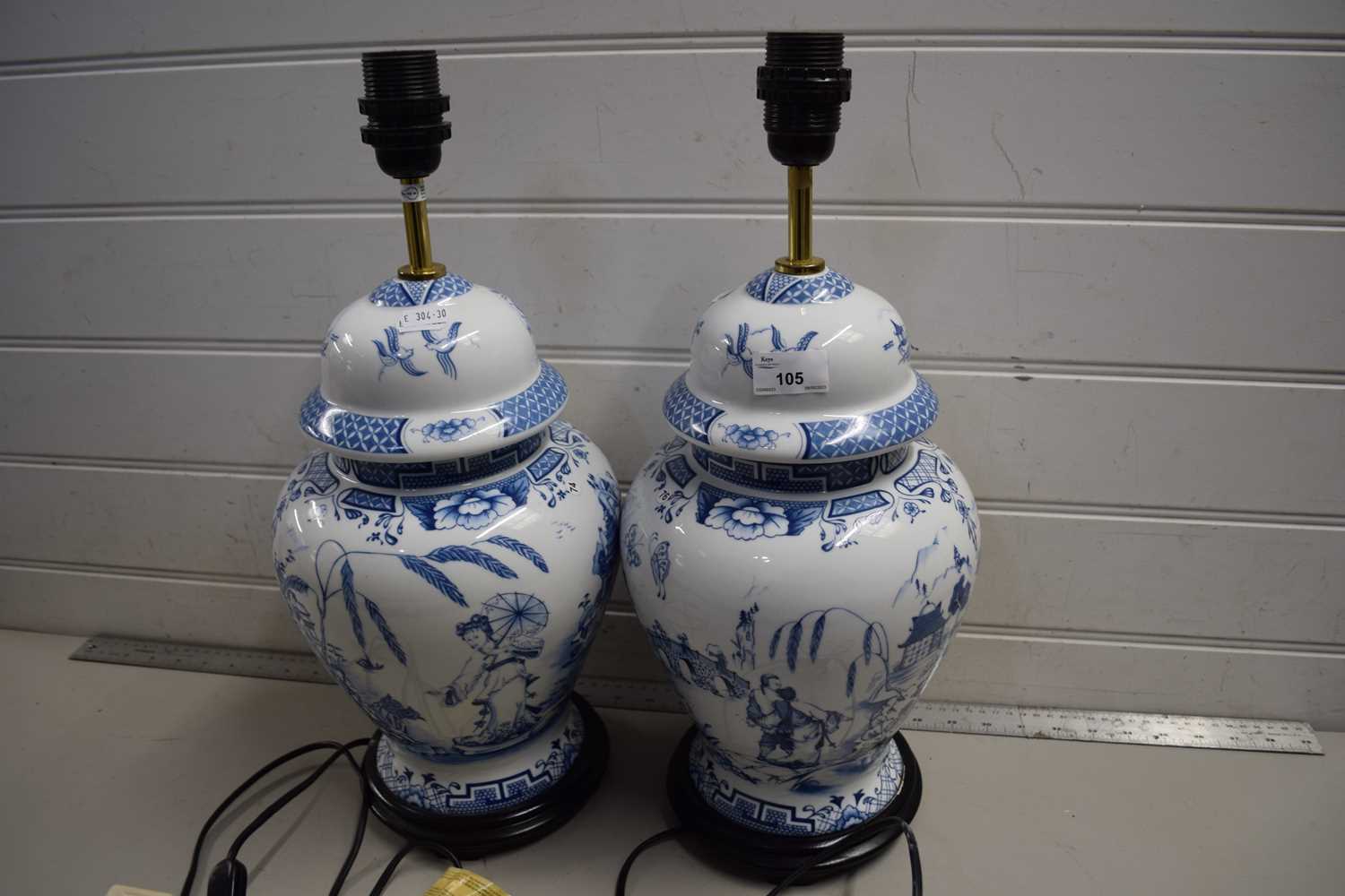 A pair of Chinese blue and white baluster lamps