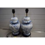 A pair of Chinese blue and white baluster lamps
