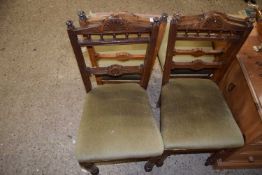 Set of four dining chairs with green seats and turned legs