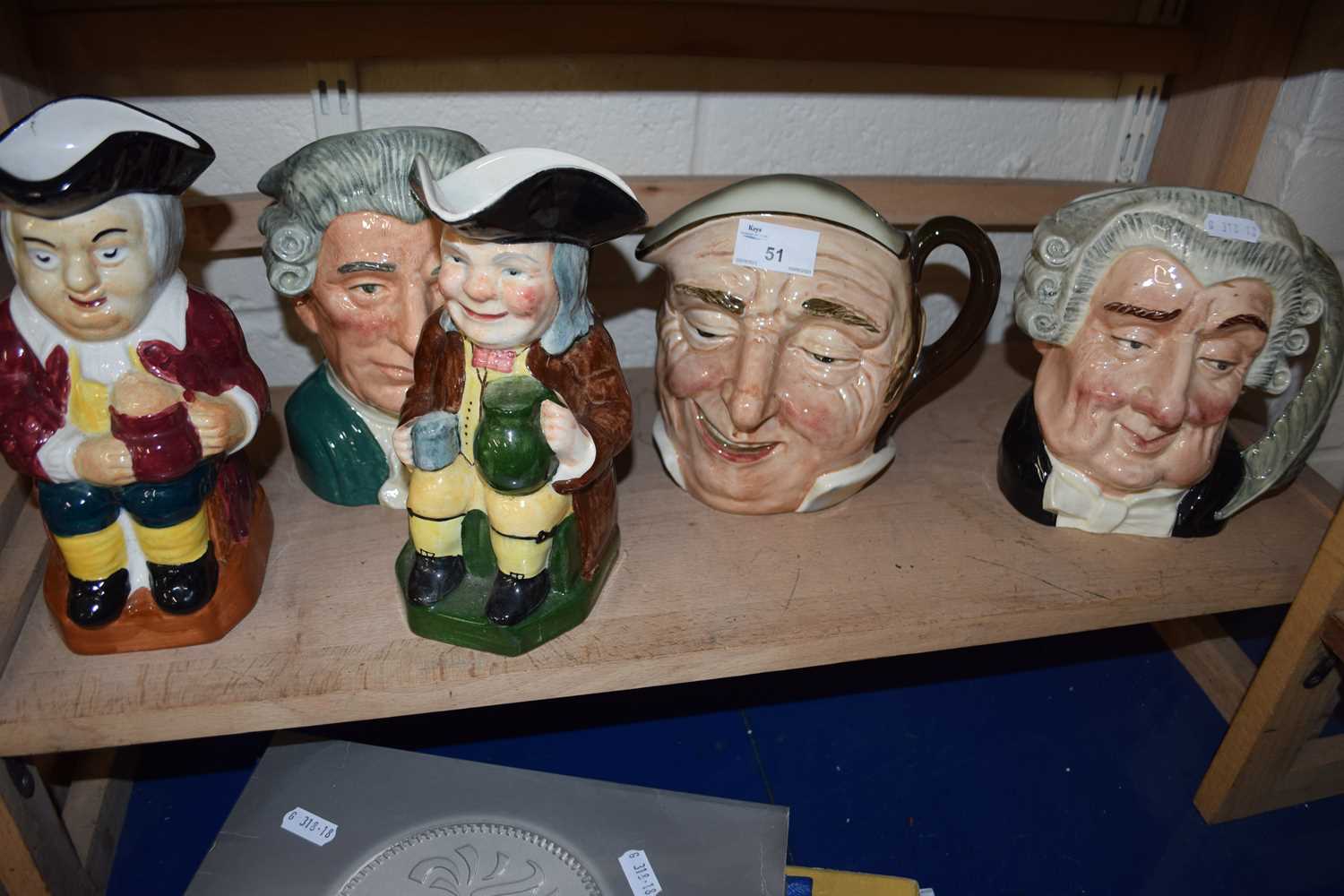 Three Royal Doulton character jugs to include The Lawyer, Apothecary and another together with two