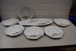 Set of Limoges fish plates and a fish platter