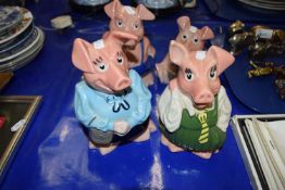 Four Nat West pigs
