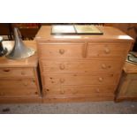 Pine chest of drawers of two short over three long, 102cm wide