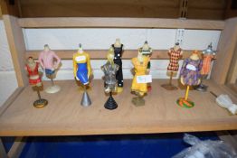 A quantity of miniature dress dummies