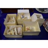 Five boxed Lenox Winnie-the-Pooh figures together with a wall mounted display mirror