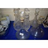 Seven assorted glass decanters
