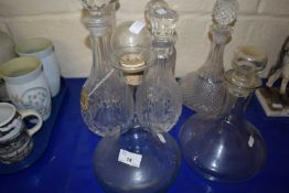Seven assorted glass decanters
