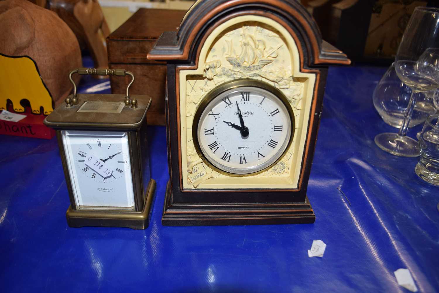 Brass cased carriage clock together with another mantel clock