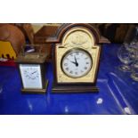 Brass cased carriage clock together with another mantel clock