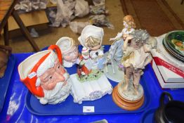 Royal Doulton Santa Claus character jug together with other figurines