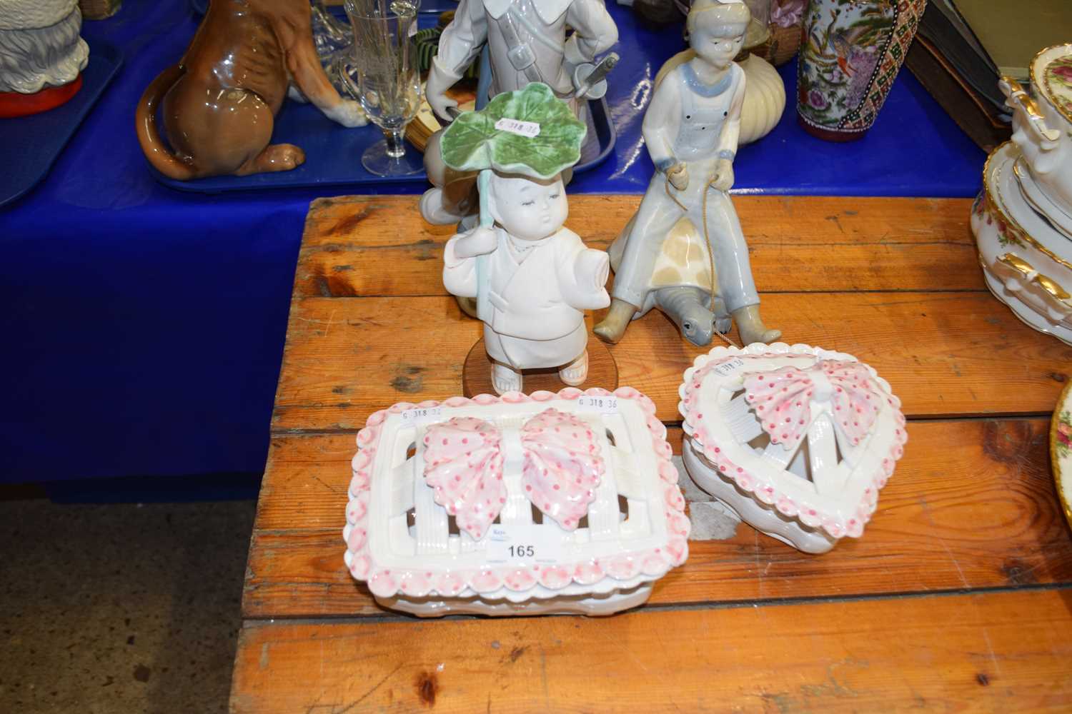 A Lladro figure together with another similar and other items