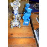 A pair of modern turquoise glazed Dogs of Fo and a pair of Dutch style candlesticks